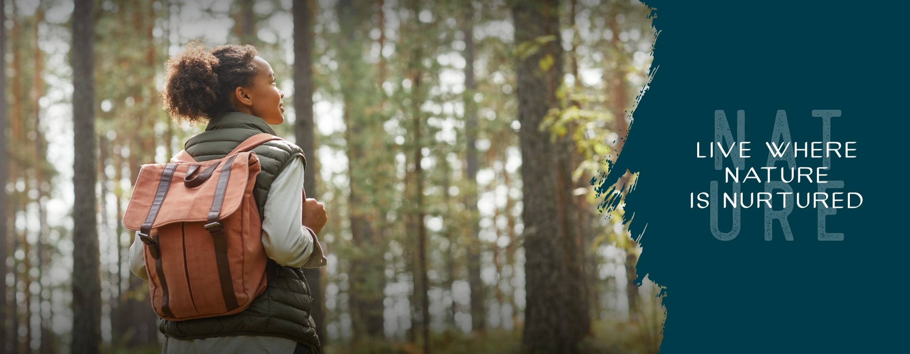 a woman walking in the woods