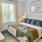 bedroom with bed and large window