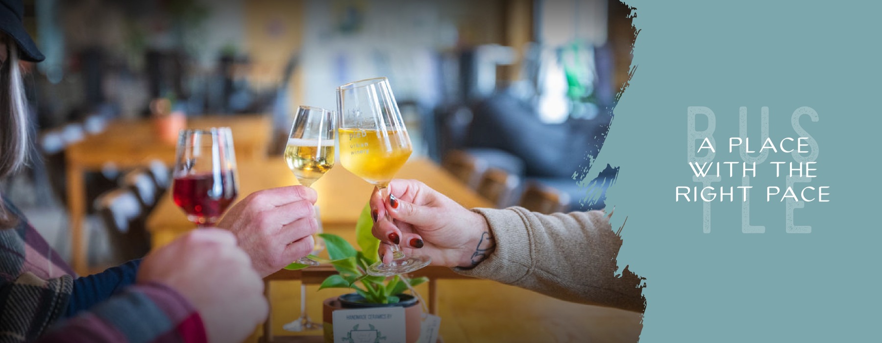 mutiple people holding glasses of wine