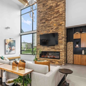 All the comforts of luxury living fireside seating in clubhouse