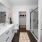 walk-in shower in well lit bathroom