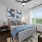 large window brightens bedroom