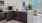 kitchen with dark bottom and white upper cabinets